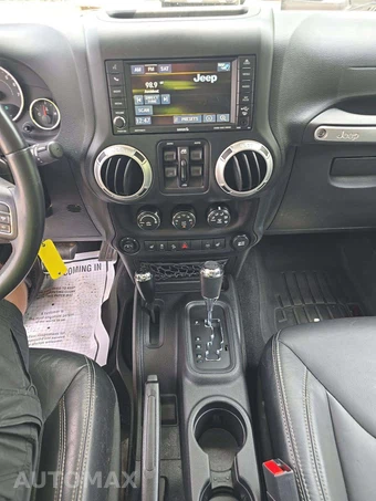 2016 Jeep Wrangler Unlimited Sahara - miniatura 10