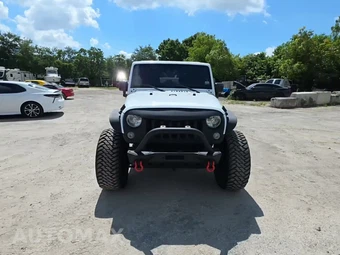 2016 Jeep Wrangler Unlimited Sport - miniatura 2