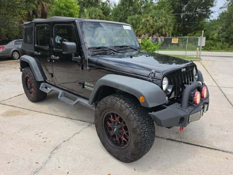 2016 Jeep Wrangler Unlimited Sport - miniatura 4