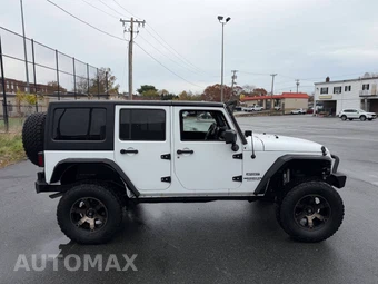 2016 Jeep Wrangler Unlimited Sport - miniatura 11