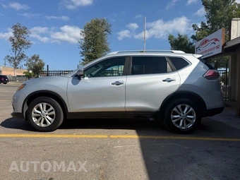 2016 Nissan Rogue SV - miniatura 8