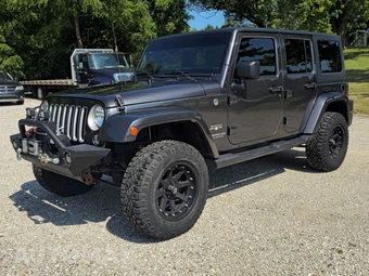 2017 Jeep Wrangler Unlimited Sahara - car from the USA, Manheim Buy-Now listing at AUTOMAX