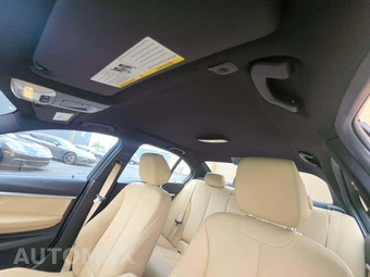 2018 BMW 3 Series Sedan 330i xDrive - miniatura 11