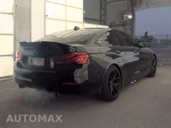 2018 BMW 4 Series Gran Coupe 440i xDrive Sedan - miniatura 4