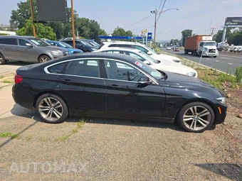 2019 BMW 4 Series Gran Coupe 430i xDrive Sedan - miniatura 4
