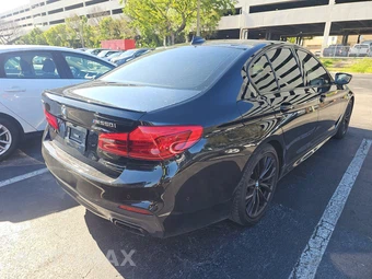2019 BMW 5 Series Sedan M550i xDrive - miniatura 4