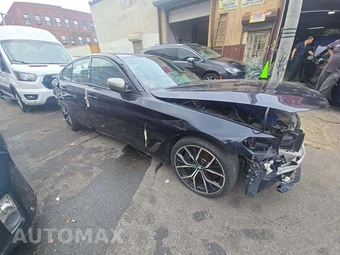 2021 BMW 5 Series Sedan M550i xDrive - miniatura 4