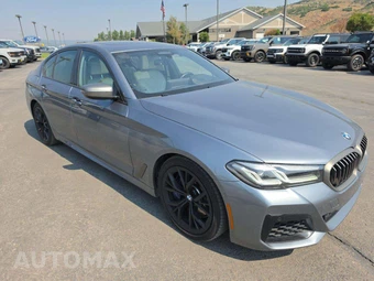 2022 BMW 5 Series Sedan M550i xDrive - miniatura 4