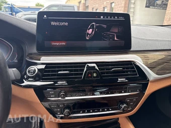 2022 BMW 5 Series Sedan M550i xDrive - miniatura 46