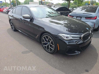 2022 BMW 5 Series Sedan M550i xDrive - miniatura 4