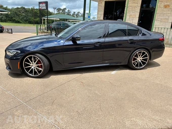 2023 BMW 5 Series Sedan M550i xDrive - miniatura 7