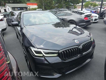 2023 BMW 5 Series Sedan M550i xDrive - miniatura 4