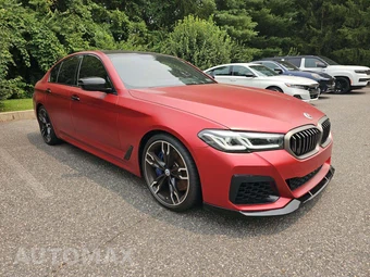 2023 BMW 5 Series Sedan M550i xDrive - miniatura 4