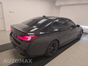 2023 BMW 5 Series Sedan M550i xDrive - miniatura 4