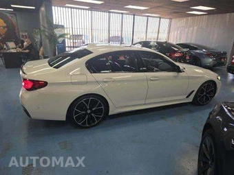 2023 BMW 5 Series Sedan M550i xDrive - miniatura 4