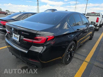 2023 BMW 5 Series Sedan M550i xDrive - miniatura 4