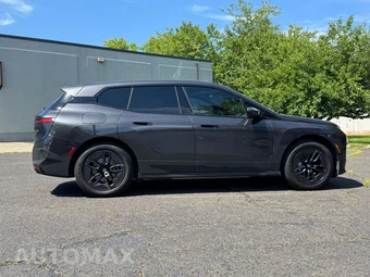 2025 BMW iX xDrive50 - miniatura 4