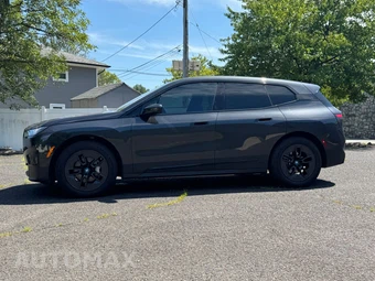 2025 BMW iX xDrive50 - miniatura 9