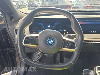 2025 BMW iX xDrive50 - miniatura 16