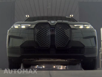 2025 BMW iX xDrive50 - miniatura 3