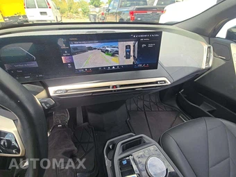 2025 BMW iX xDrive50 - miniatura 10