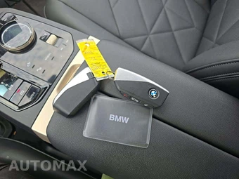 2025 BMW iX xDrive50 - miniatura 8