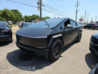 2025 Tesla Cybertruck Crew Cab Medium Bed - car from the USA, Manheim Buy-Now listing at AUTOMAX