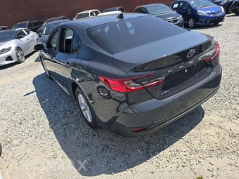 2025 Toyota Camry LE - miniatura 2