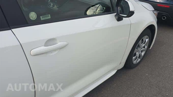 2025 Toyota Corolla Hybrid LE Sedan - miniatura 21