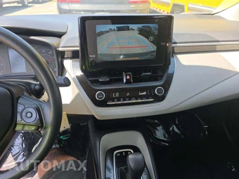 2025 Toyota Corolla Hybrid LE Sedan - miniatura 10