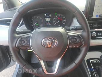 2025 Toyota Corolla Hybrid SE Sedan - miniatura 10
