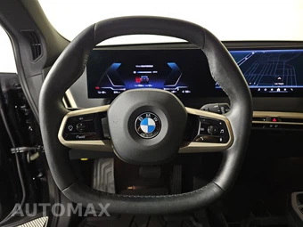 2026 BMW iX xDrive45 - miniatura 10