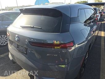 2026 BMW iX xDrive45 - miniatura 4