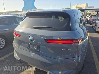 2026 BMW iX xDrive45 - miniatura 5