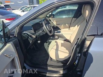 2026 BMW iX xDrive45 - miniatura 7