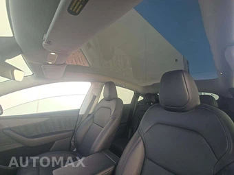 2026 Tesla Model Y Premium - miniatura 8