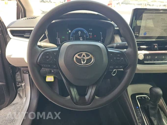 2026 Toyota Corolla Hybrid LE Sedan - miniatura 10