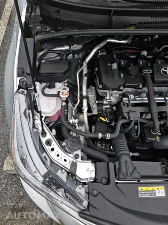 2026 Toyota Corolla Hybrid LE Sedan - miniatura 24