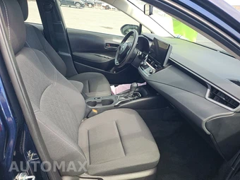 2026 Toyota Corolla Hybrid LE Sedan - miniatura 8