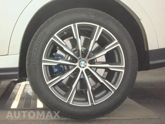 2027 BMW X6 Sports Activity Coupe M60i xDrive - miniatura 12