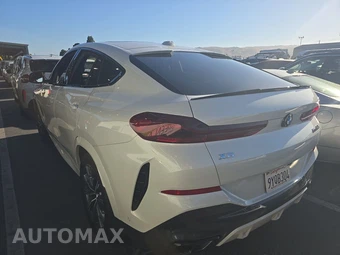 2027 BMW X6 Sports Activity Coupe M60i xDrive - miniatura 6